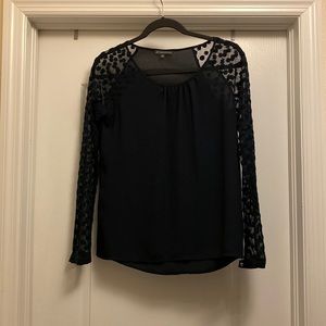 Navy blouse with see-through polka dot sleeves